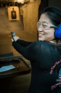 naoma shooting a revolver